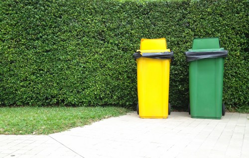 Construction waste being loaded into a builders skip